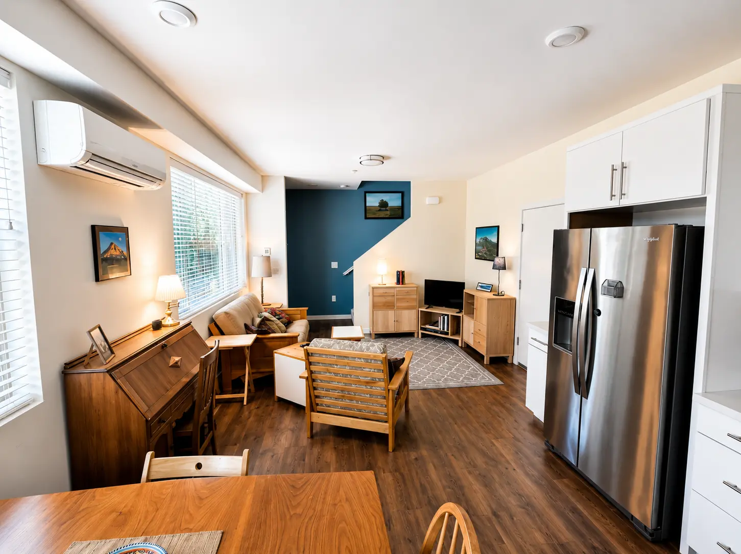 Furnished living and dining area at 166 Log Pond Ln