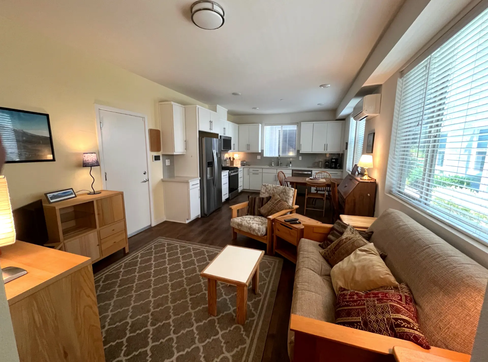 Open living room with natural light and dining nook